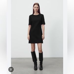 True to size black quarter, puff sleeve mini dress
